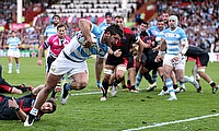 Argentina's Tomas Cubelli breaks through to score in their 54-9 World Cup victory over Georgia
