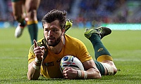 Adam Ashley-Cooper scored two tries in the first half and one in the second to put Australia into the final