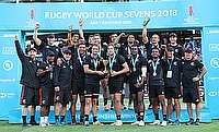 New Zealand players and staff celebrate the successful defence of their Rugby World Cup Sevens title after a 33-12 defeat of England