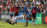 Italy on the attack against England in their Pool B match at Club de Rugby Ateneo Inmaculada