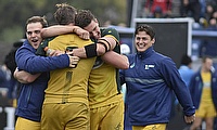 Australia's players celebrate after beating Argentina in their semi-final at the Racecourse Stadium in Rosario on day four of the World Rugby U20 Cham