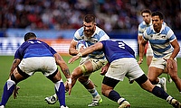 Marcos Kremer of Argentina takes on Ben Lam and Seilala Lam of Samoa during the Rugby World Cup game at Stade Geoffroy-Guichard
