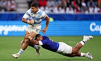 Santiago Chocobares of Argentina is tackled by Alai D'Angelo Leuila of Samoa during the Rugby World Cup game