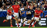 Duhan van der Merwe of Scotland breaks with the ball during the Rugby World Cup game against Tonga