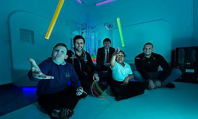 Richie Vernon, Brendan Dick and Gordon Reid with students in the BT Sensory Room