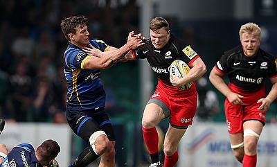 Chris Ashton, pictured centre, scored a hat-trick of tries for Saracens