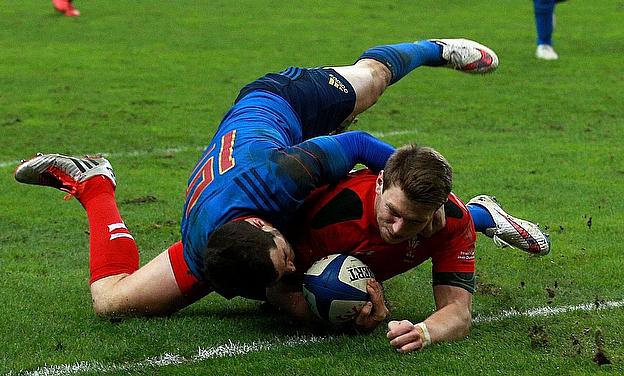 Dan Biggar goes over for Wales' try
