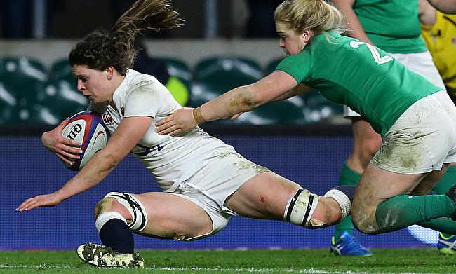 Abbie Scott, left, touches down for England's second try
