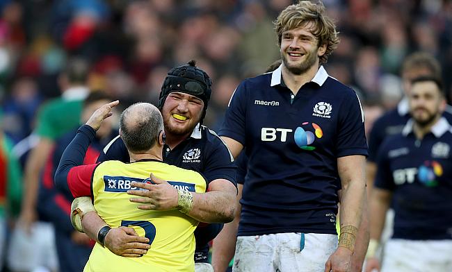 Scotland prop Zander Fagerson, left in scrum cap, has hit out at plans to squeeze the RBS 6 Nations in to a four-week window