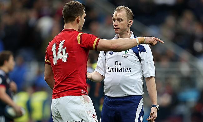 Wales wing George North in discussion with referee Wayne Barnes during Saturday's Six Nations clash against France