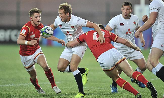 England captain Max Malins tries to burst through the Welsh defence in their Pool A match at Avchala Stadium