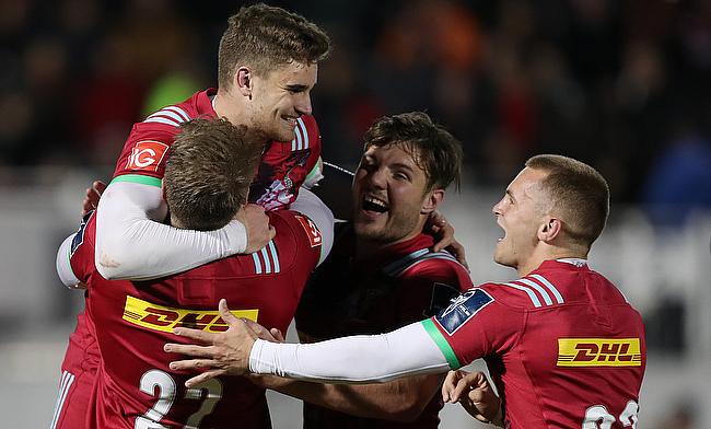 Harlequins James Lang is congratulated by team mates after kicking the winning conversion during the Anglo Welsh Cup match at Allianz Park, London.