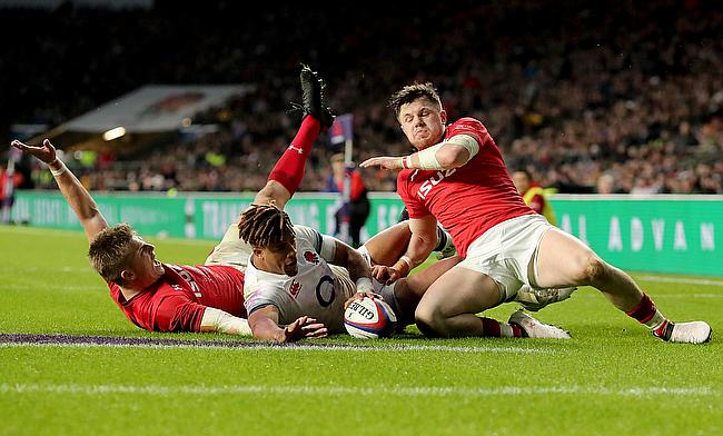 Not even video technology could easily clear up whether Gareth Anscombe, left, had scored for Wales in the key moment against England