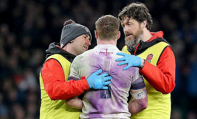 Sam Simmonds is treated by staff during the NatWest 6 Nations match against Wales