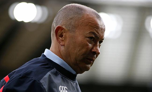 Eddie Jones travelled alone by train via a standard class on a train full of football fans to be a guest of Sir Alex Ferguson at Old Trafford.