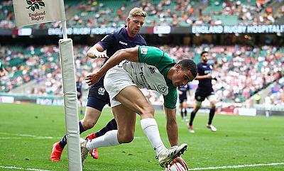 Ireland's Jordan Conroy scores a try against Scotland on day one of the HSBC World Rugby Sevens Series at Twickenham Stadium in London