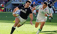 Alex Dunbar goes in for a try for Scotland