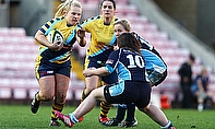 Lauren Chenoweth takes the ball into the Sharks defence