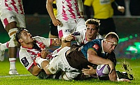 Harlequins' James Chisholm scored two tries in a dominant performance against Stade Francais