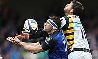 Leinster's Fergus McFadden, left, contests a dropping ball with Wasps' Willie Le Roux