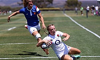 Kelly Smith (right) scoring a try for England