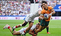 Jordan Petaia of Australia is tackled by Miriani Modebadze of Georgia