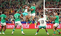 Kurt-Lee Arendse of South Africa contends for the aerial ball with Hugo Keenan of Ireland