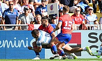 Facundo Isa of Argentina is tackled by Inaki Ayarza and Domingo Saavedra of Chile