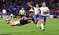 Damian Penaud of France scores his team's fourth try during the Rugby World Cup game against Italy