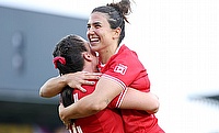 Julia Schell of Canada celebrates victory with teammate Alysha Corrigan after the Women's Rugby World Cup 2025 Pool B match against Fiji