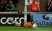 Desiree Miller of Australia scores her team's third try during the Women's Rugby World Cup 2025 Pool A match between USA and Australia