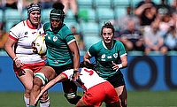 Grace Moore of Ireland is tackled by Anne Fernandez de Corres of Spain during the Women's Rugby World Cup 2025 Pool C match