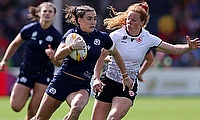 Francesca McGhie of Scotland runs with the ball whilst under pressure from Alex Tessier of Canada during the Women's Rugby World Cup 2025 Pool B matc