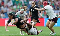 Liana Mikaele-Tu'u of New Zealand is tackled by Ruth Campbell (L) and Claire Boles of Ireland during the Women's Rugby World Cup 2025 Pool C match