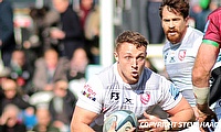 Gloucester beat Bath 23-5 at Kingsholm despite three yellow cards, with Freddie Thomas and Max Llewellyn scoring in a hard-fought derby.