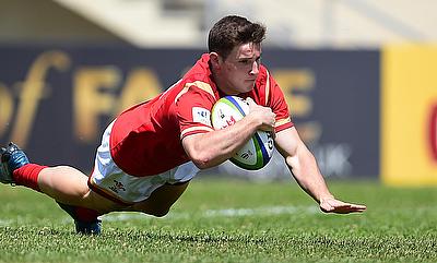 Replacement scrum-half Dane Blacker dives over for a try during their Pool A match with Samoa at Avchala Stadium