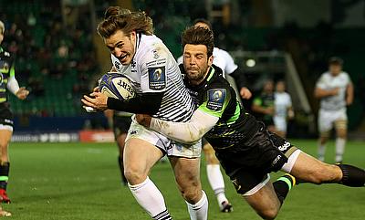 Jeff Hassler (left) goes over for Ospreys' sixth try of the night