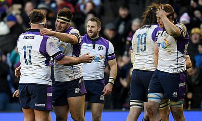 Scotland team celebrate victory over France in Round 2