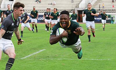 South Africa centre Wandisile Simelane scores one of his three tries in their Pool C win over Ireland