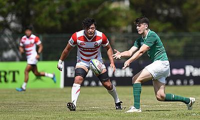 Ireland fly-half Harry Byrne passes during their 11th place play-off with Japan on day five of the World Rugby U20 Championship