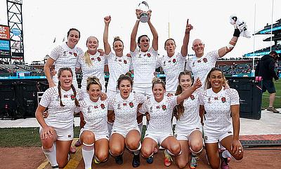 The England women's team pose with the trophy after wining the Challenge final against Japan during day two of the Rugby World Cup Sevens