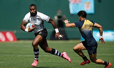 Amenoni Nasilasila of Fiji competes against Lautaro Bazan Velez of Argentina during day two of the Rugby World Cup Sevens