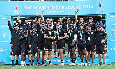 New Zealand players and staff celebrate the successful defence of their Rugby World Cup Sevens title after a 33-12 defeat of England