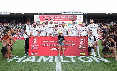 England players pose with the Challenge Trophy on day two of the HSBC World Rugby Sevens Series in Hamilton