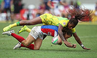 France's Fanny Horta is caught by Australia's Ellia Green on day two of the HSBC World Rugby Women's Sevens Series in Sydney