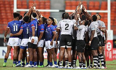 Fiji and Samoa team huddle before game on day one of the HSBC World Rugby Sevens Series in Sydney