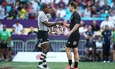 Fiji captain Paula Dranisinukula presents a token of condolences to New Zealand captain Scott Curry in memory of the victims of the Christchurch Mosqu