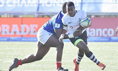 France's Jordan Joseph tries to stop another Fiji attack in their Pool A match at the Racecourse Stadium in Rosario on day one of the World Rugby U20