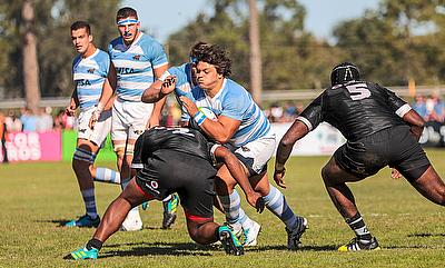 Argentina charge at the Fiji defence in their Pool A match at Club de Rugby Ateneo Inmaculada