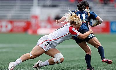 England's Abi Burton tackles against Japan's on day two of the HSBC Canada Women's Sevens at Starlight Stadium on 1st May